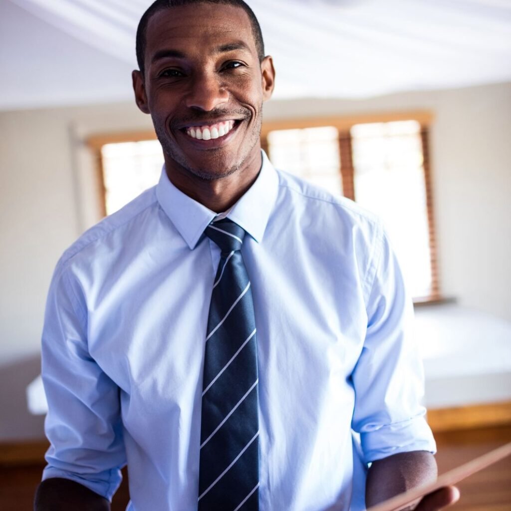 male supervisor standing with a file in hotel vklzkuk 1.jpg
